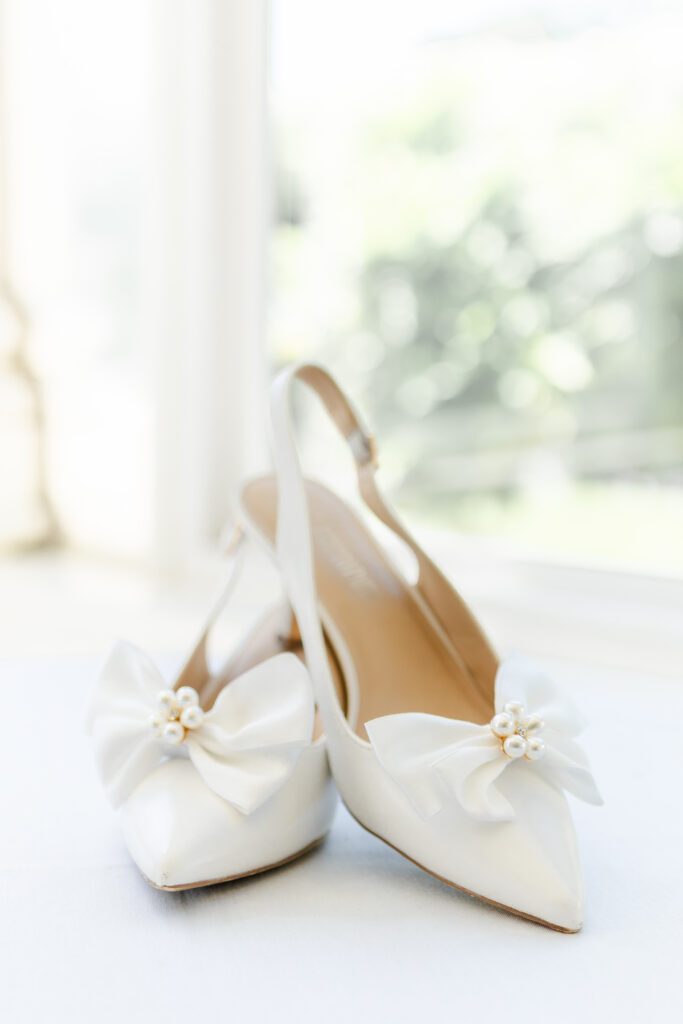 bridal shoes in the window at jefferson street mansion captured by sacramento wedding photographer