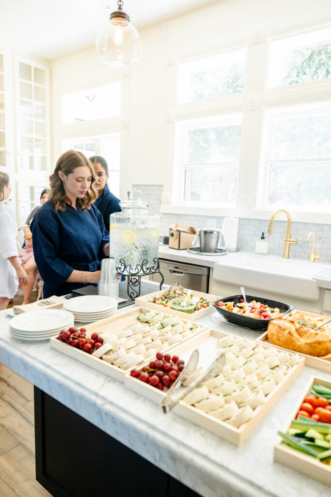 bridesmaids and bride eating brunch the morning of a wedding at Park Winters in Winters, California captured by a sacramento wedding photographer