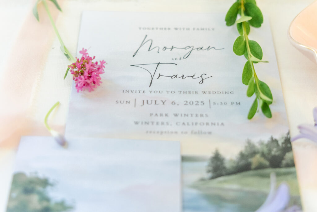 invitation and wildflowers at Park Winters in Winters, California captured by a sacramento wedding photographer
