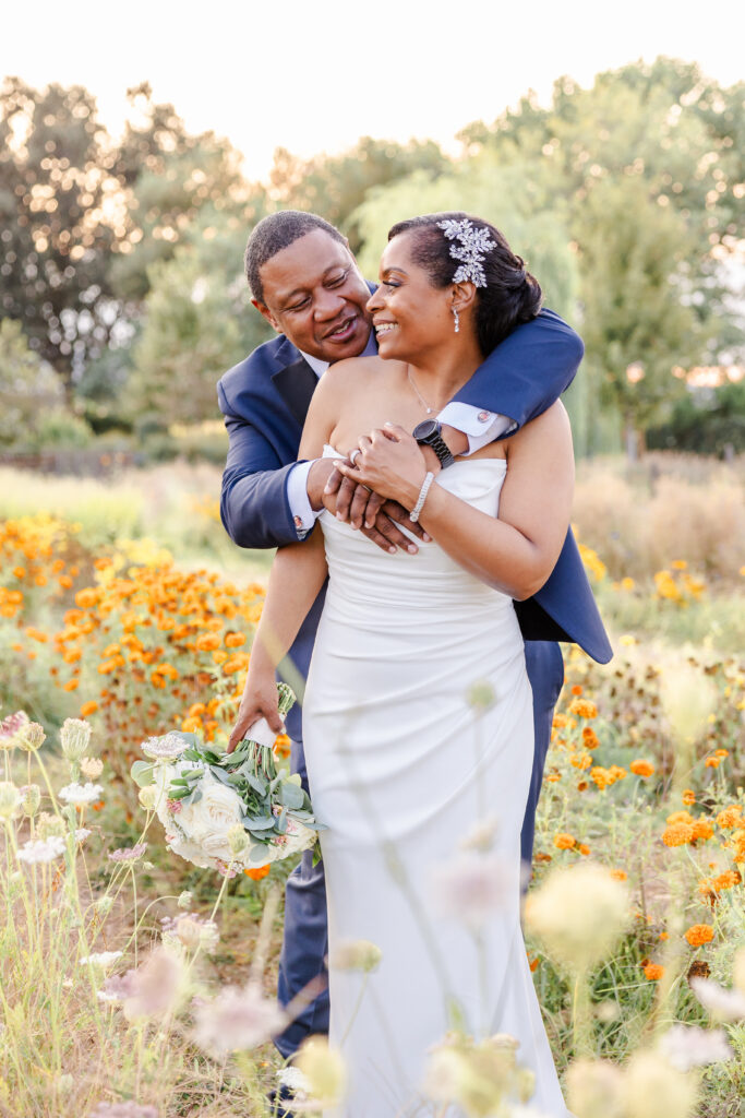 Bride and groom share a moment in the flower fields at Park Winters Wedding captured by Sacramento Wedding Photographer
