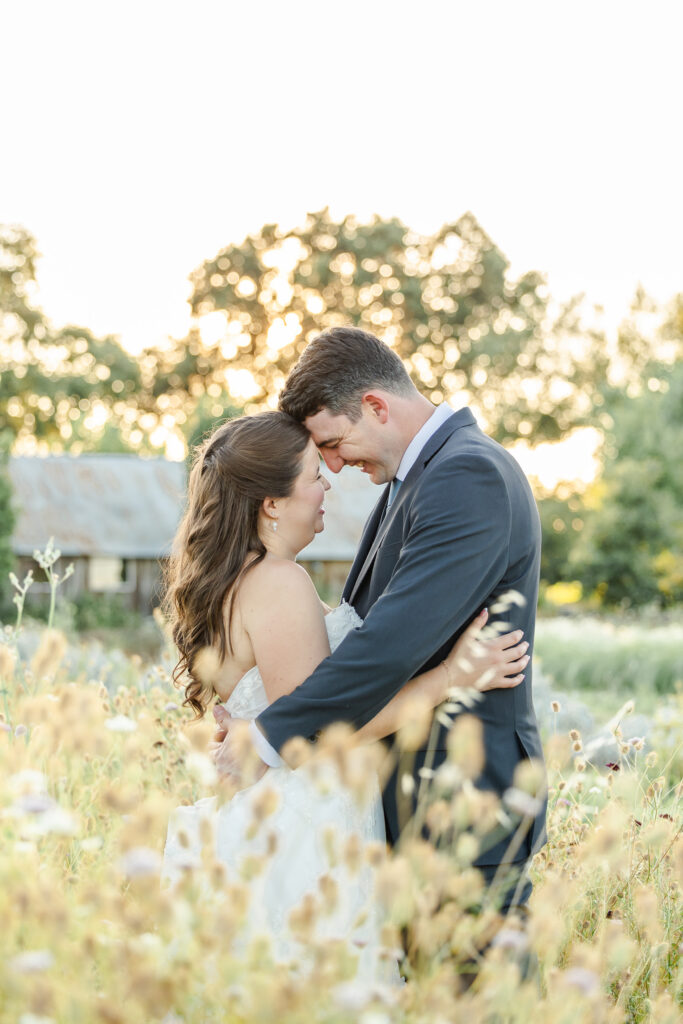 Bride and groom enjoy a quiet moment alone in the flower fields at Park Winters Wedding captured by Sacramento Wedding Photographer