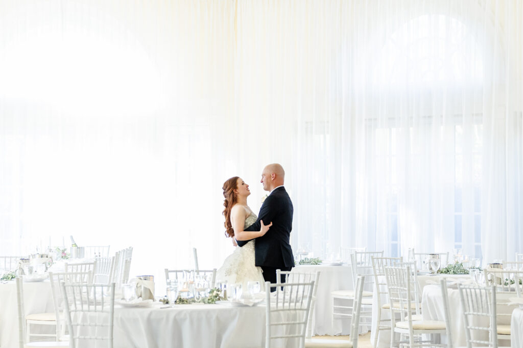 Bride and Groom share private first dance in the reception space at vizcaya sacramento