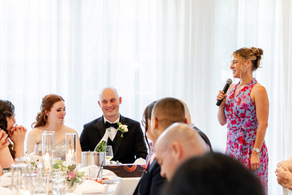 Mother of the groom shares kind words at vizcaya wedding venue captured by a sacramento wedding photographer