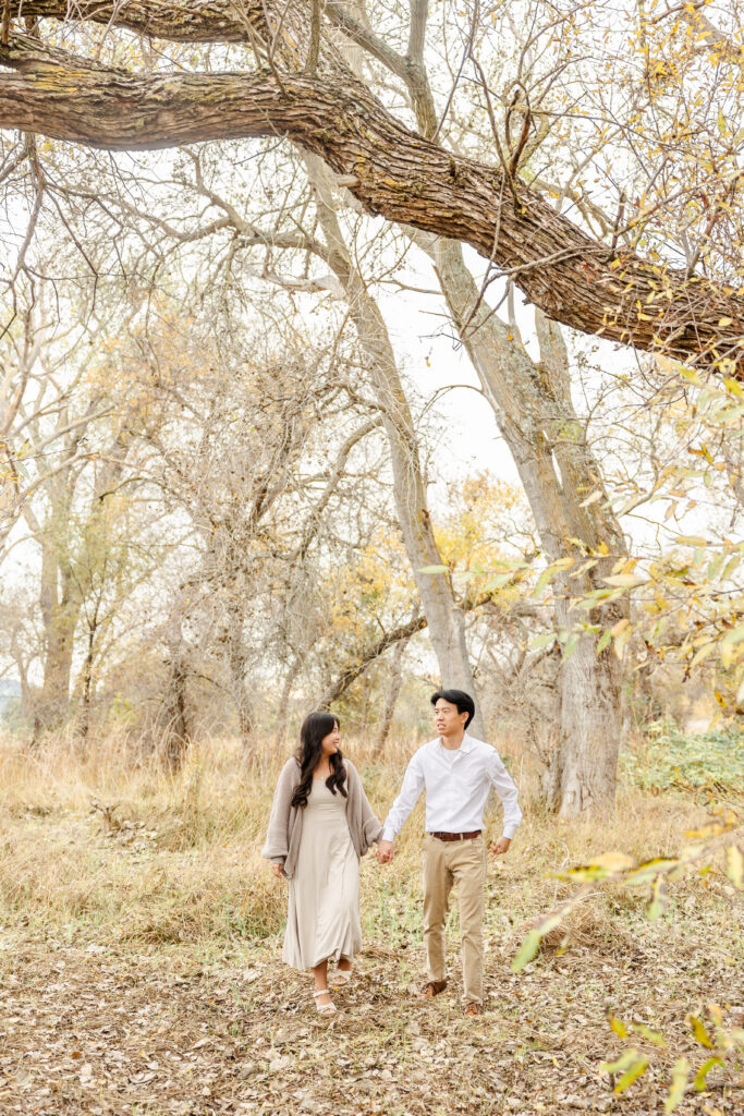Couple walks during sacramento engagement session